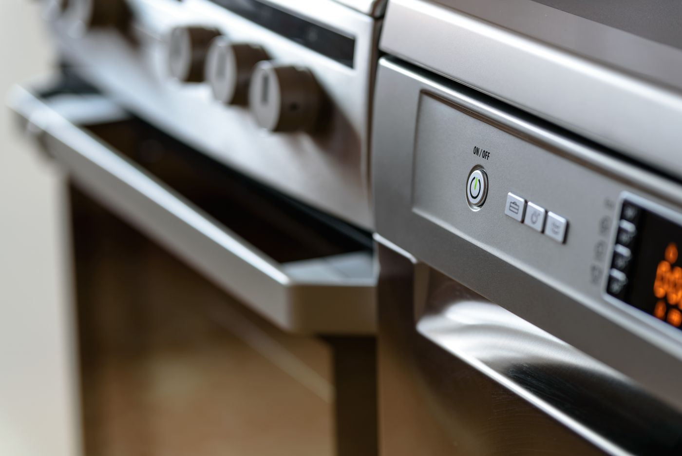 Close-up of a stainless steel oven control panel