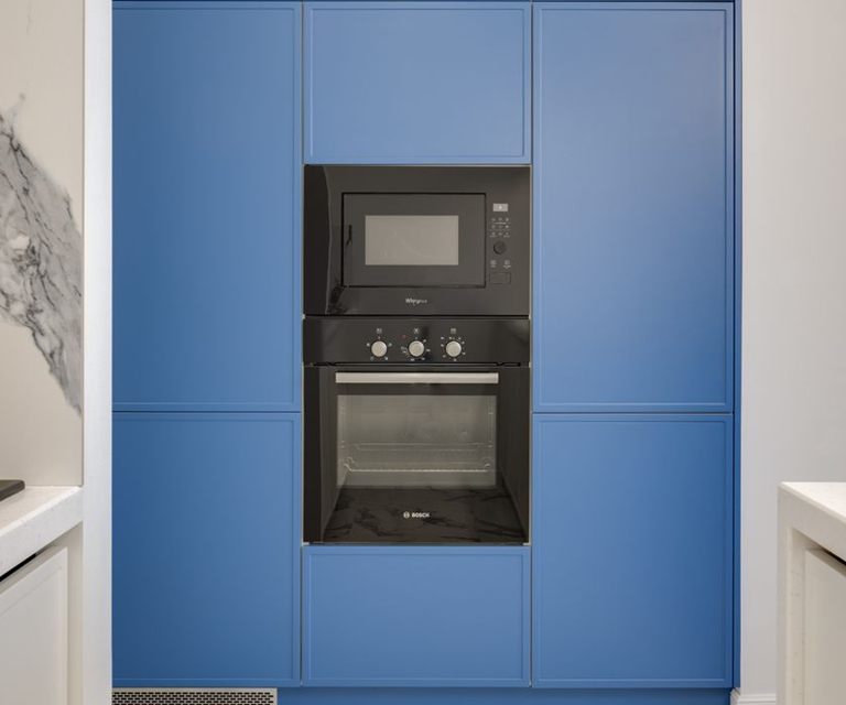 Built-in wall oven and microwave in a modern kitchen